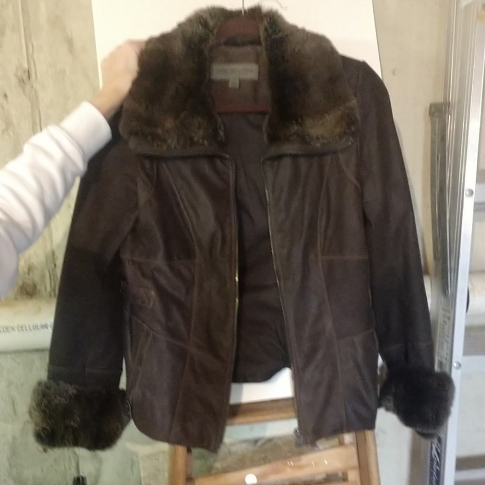 Leather jacket with real fur collar and cuffs